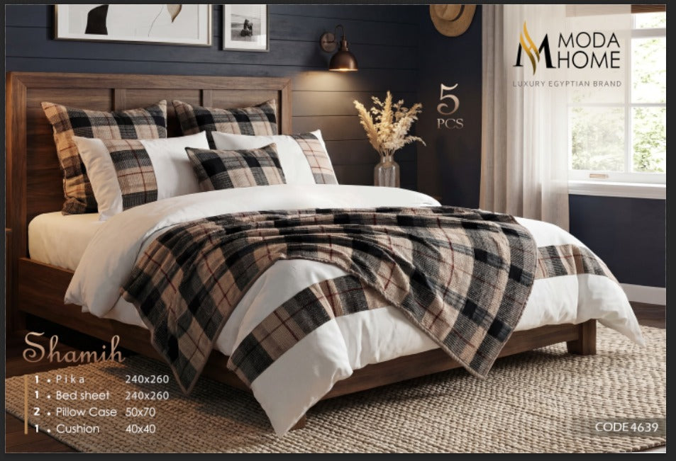 MODA HOME Shamiya 5-piece checkered coverlet set with bed sheets and pillowcases on a bed, showcasing the stylish bedroom decor.
