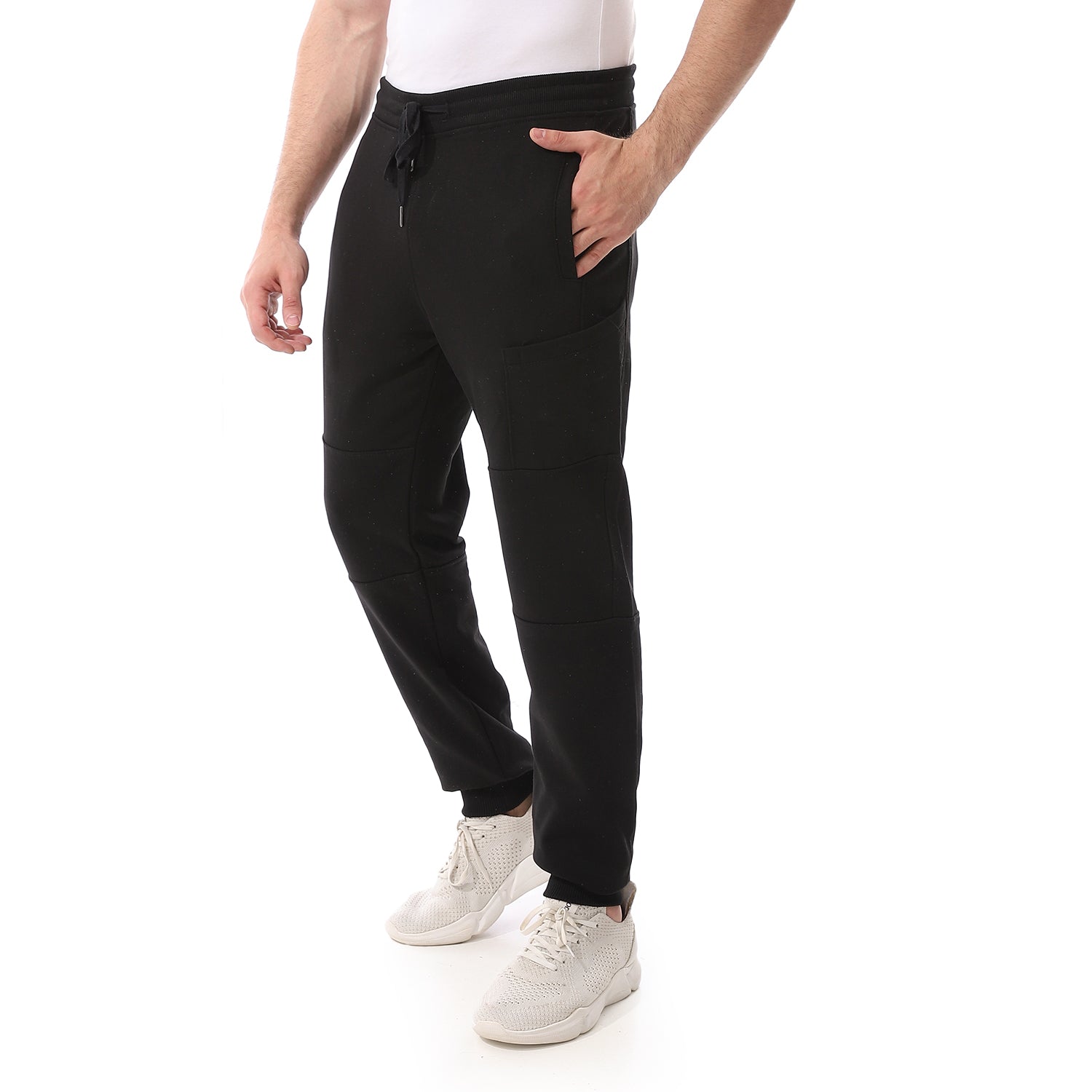 Black men's sweatpants from Husseinyoussef Summer Melton line, featuring a comfortable fit and casual style.