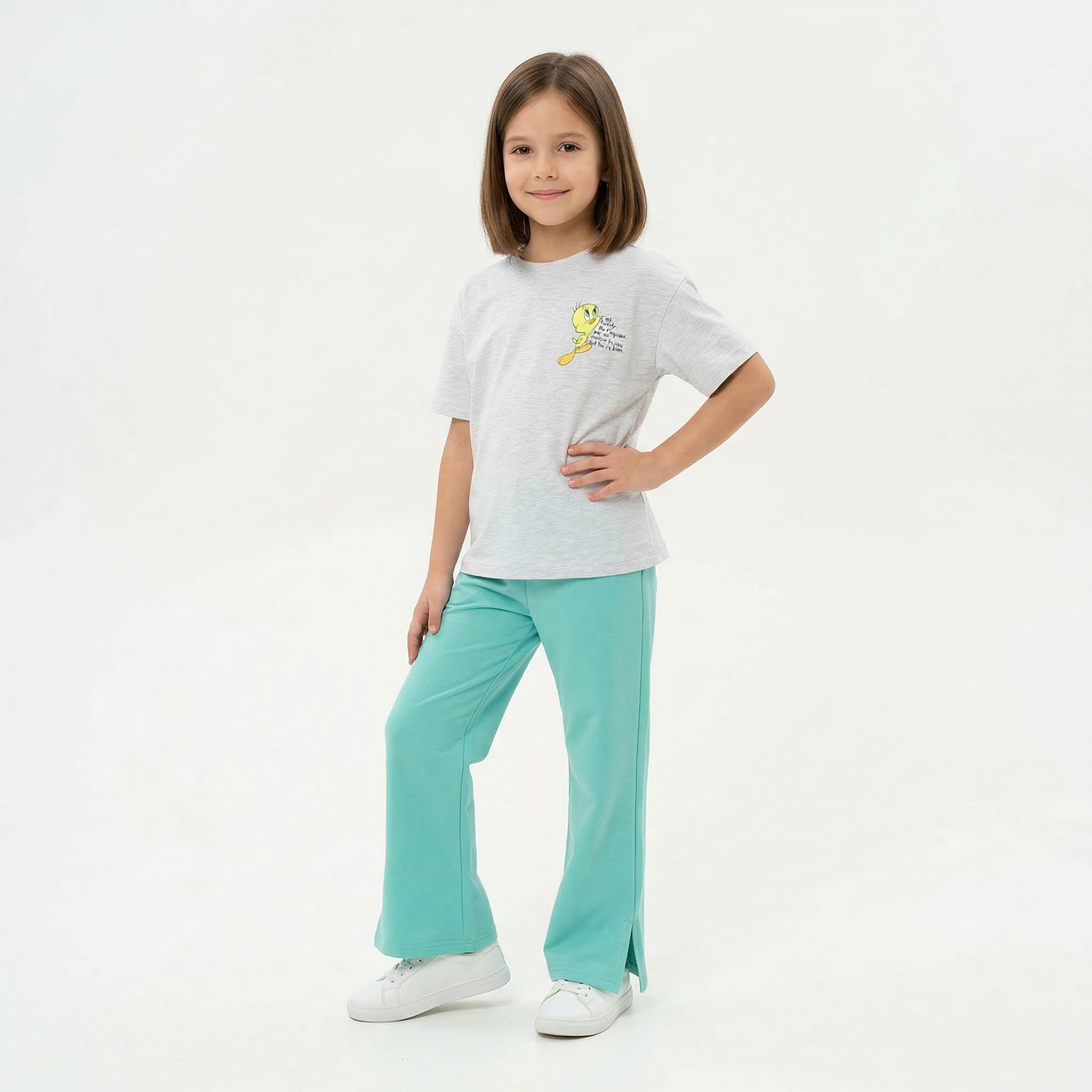 Pink girls' pajamas set by MARVY featuring a Tweety Bird design, soft fabric, and comfortable fit for kids.