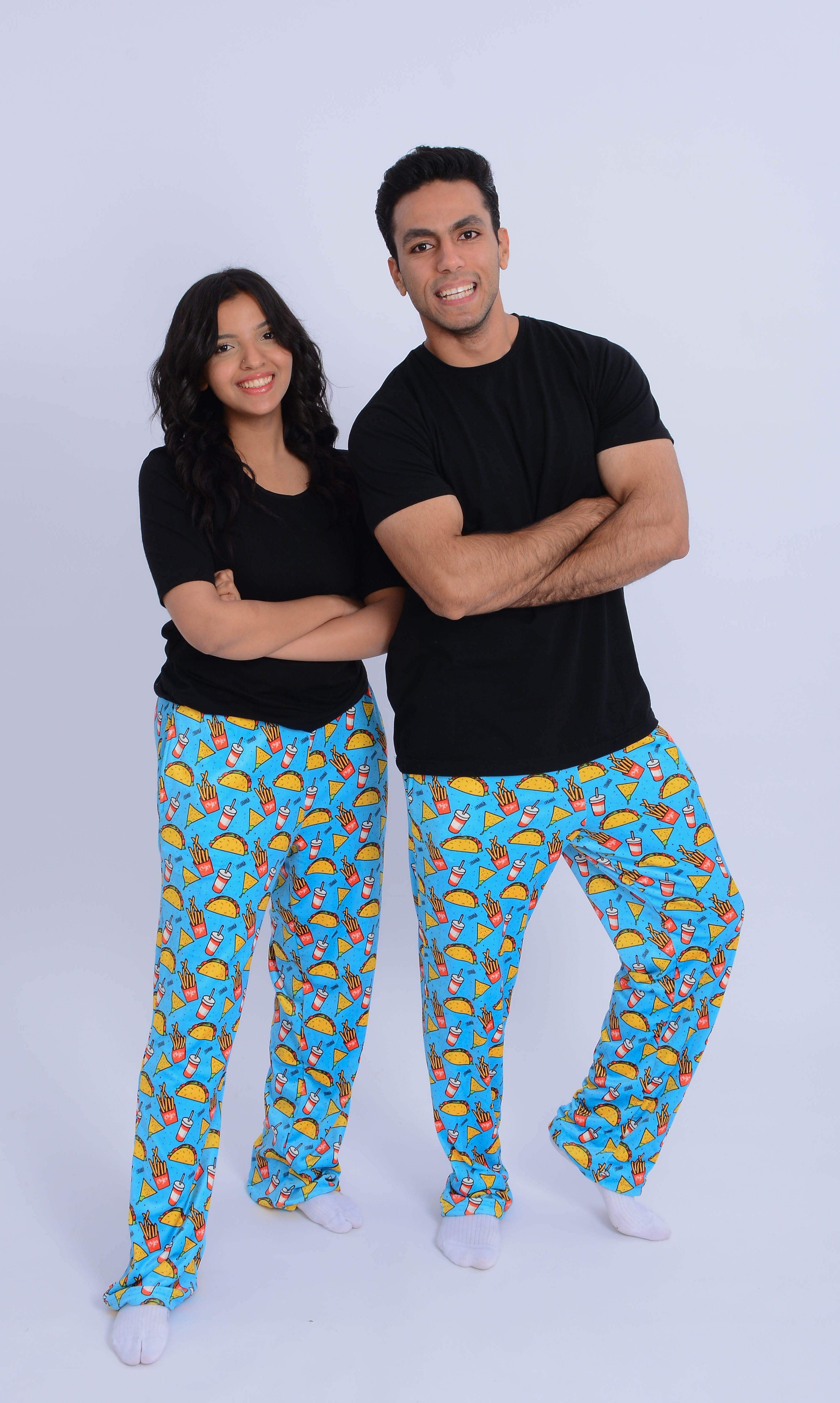 Details MIX FOODS Velvet Pants in black, showcasing a smooth fabric and relaxed fit with an elastic waistband.