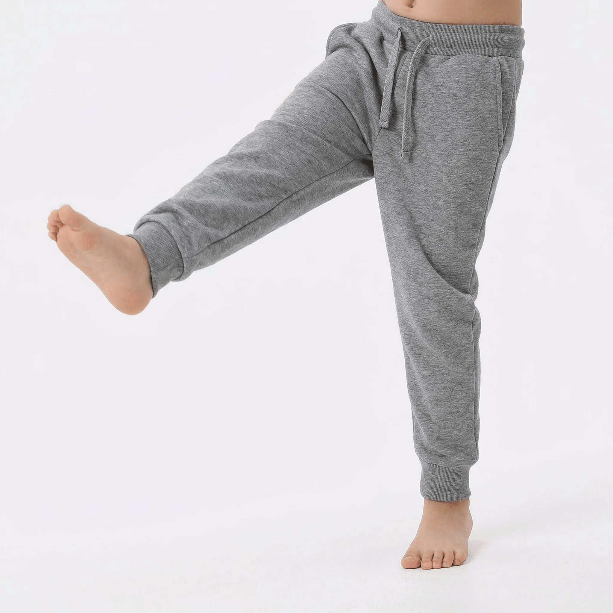 Kids basic sweatpants by Details, showing navy blue cotton joggers with elastic waistband and relaxed fit.