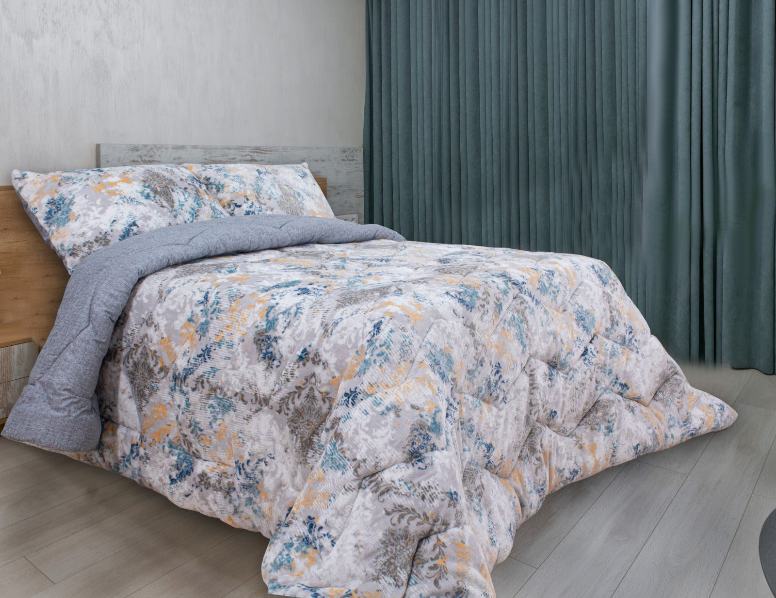 Moda Home quilt set with three matching pillows, featuring a stylish fabric pattern and cozy bedding for a comfortable bedroom look.