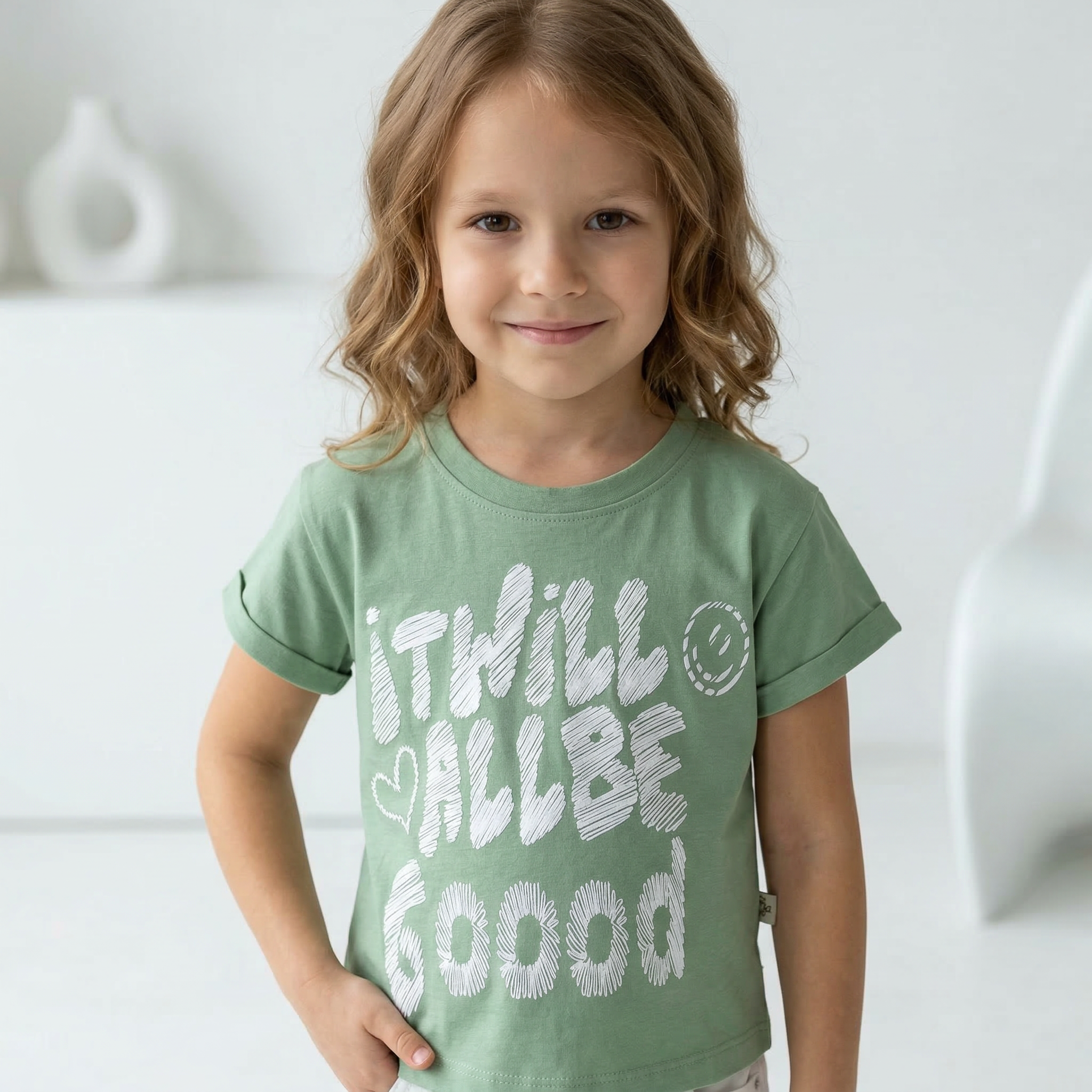 Angel I WILL BE T-shirt featuring bold printed text on a comfortable cotton fabric in a casual style.