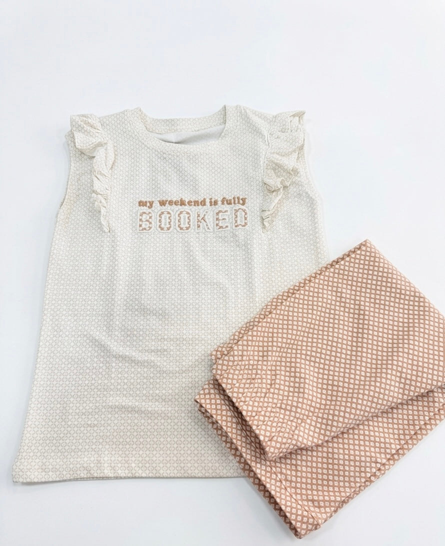 YAYA BOOKED CUT & PANTACORE pajama set featuring a printed top and matching pants for comfortable sleepwear.
