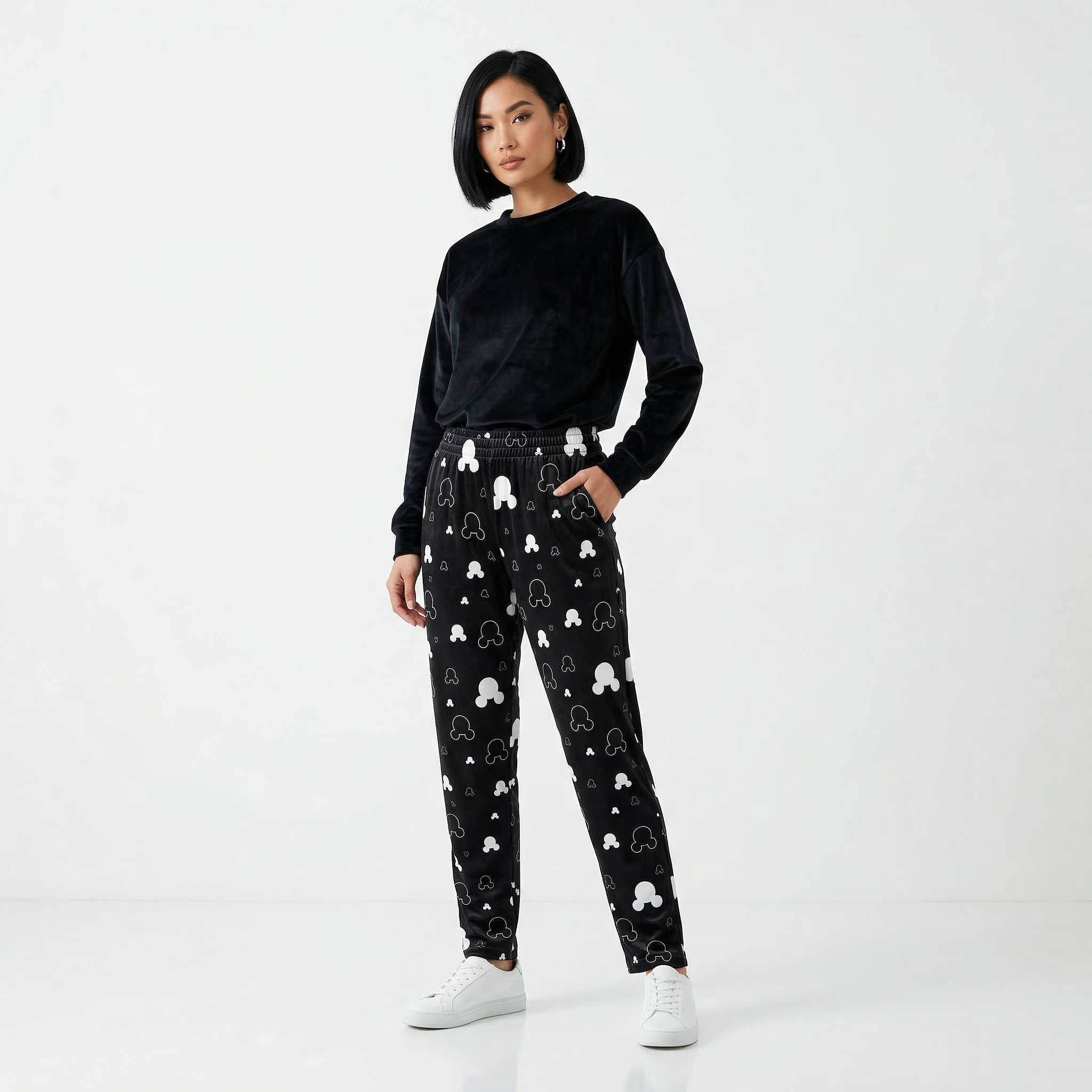 Mickey Mouse night pajamas for kids by Details, featuring Mickey Mouse print on soft, comfortable fabric.