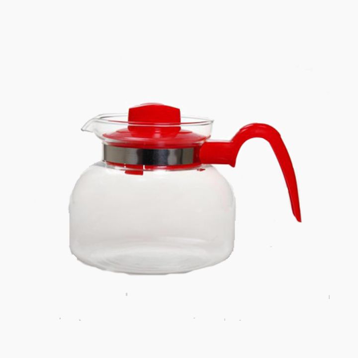 Thermal glass Arabic B tea pot, 1.5 liters, on a table, showcasing a sleek design and clear glass construction for hot tea.