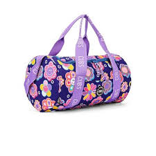 Deep purple roses bouquet in a medium CUBS Dشنطة bag, vibrant floral arrangement with lush purple blooms.