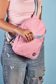 CUBS Sling front pocket bag with adjustable strap and zippered pocket, casual style for everyday use.