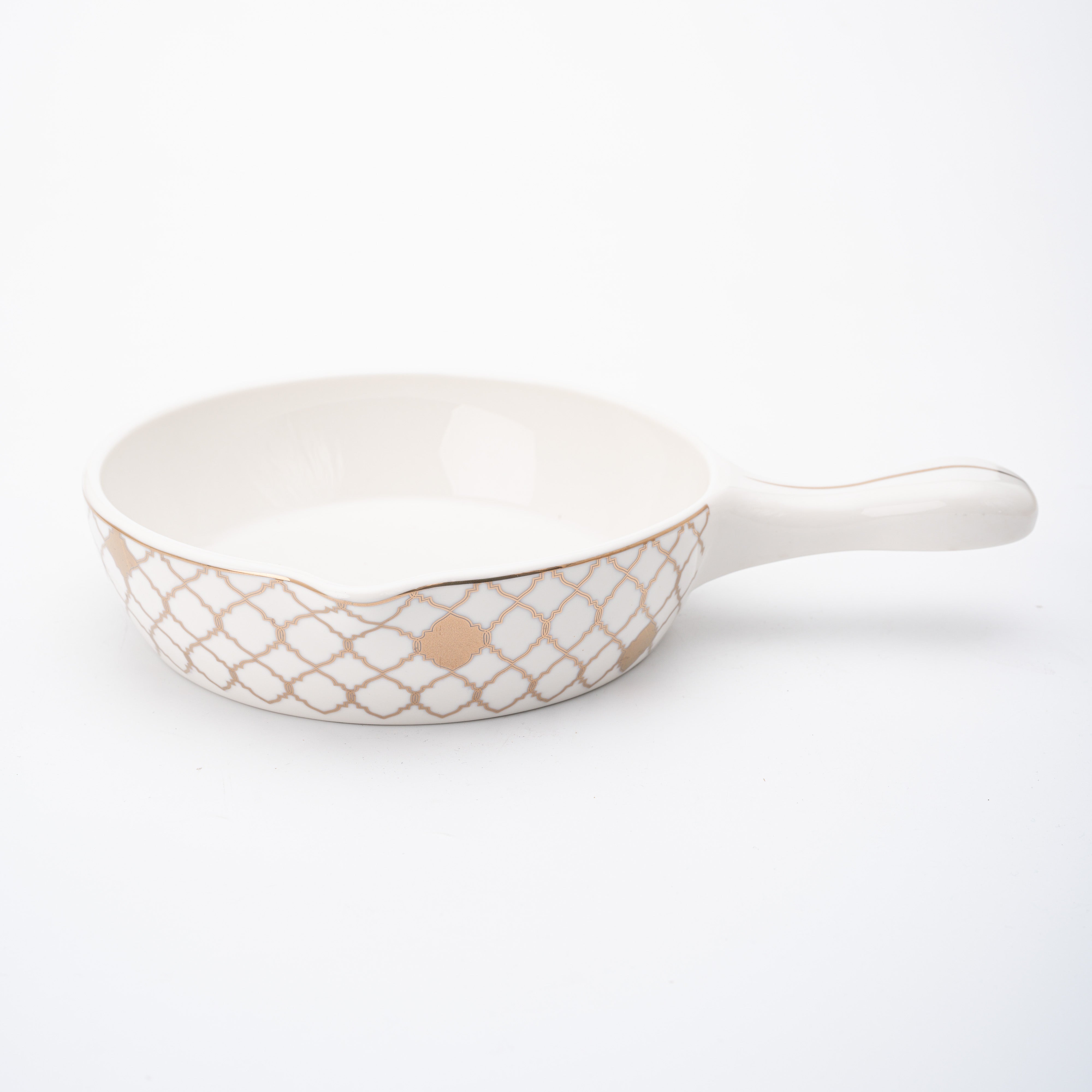 Rose Marrakech ????? ??? used for frying eggs, featuring a ceramic coating and ergonomic handle in a modern kitchen setting.