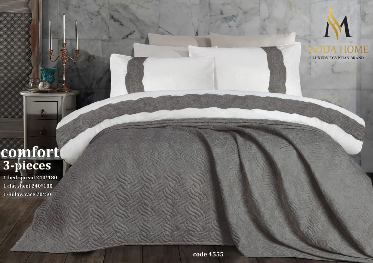 Comfort Kids Series premium 3-piece coverlet set by MODA HOME, featuring soft fabric and colorful playful patterns on a child's bed.