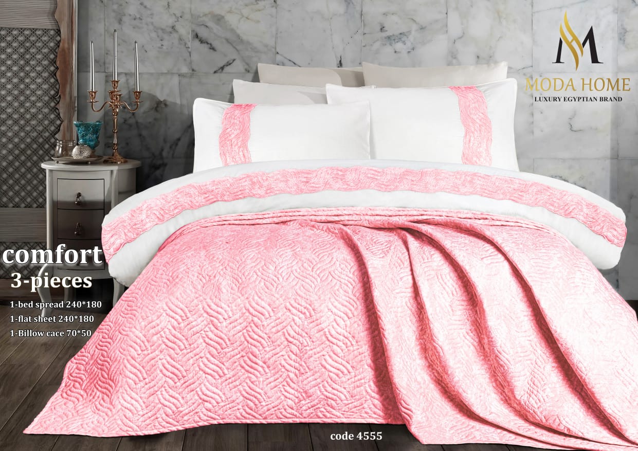 Comfort Kids Series premium 3-piece coverlet set by MODA HOME, featuring soft fabric and colorful patterns on a bed.