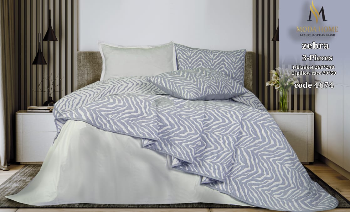 Zebra pattern 1-piece coverlet by MODA HOME, 240x260 cm, displayed on a neatly made bed with matching pillows.