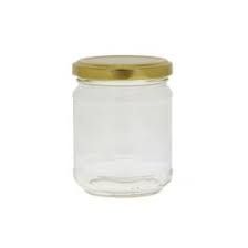 Clear Cerve برطمان jar with screw-top lid, transparent glass storage container for kitchen organization and food storage.