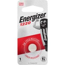 Energizer 1220BP1 lithium coin cell battery showing silver metal surface and labeling for small electronic devices