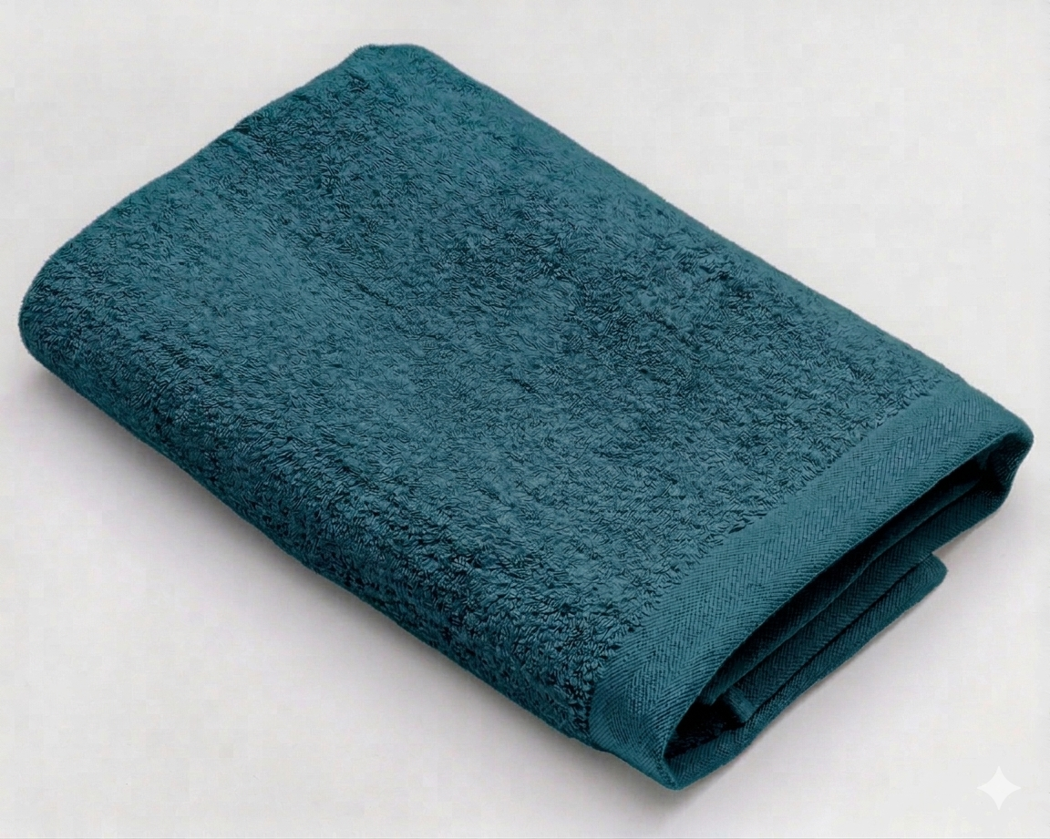 Cotton wide-border towel from MODA HOME in 50x100 cm, featuring a soft texture and stylish design with contrasting borders.