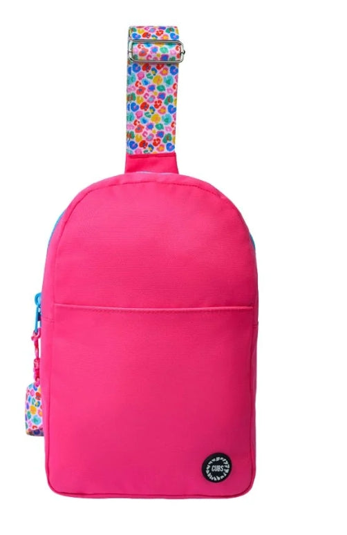 Hot pink sling bag with front pocket from CUBS, featuring a stylish and functional design, shown in a close-up image.