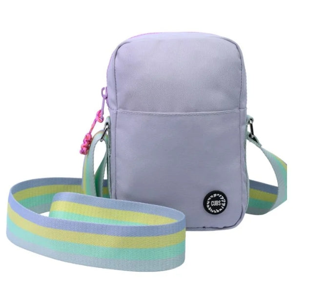Light grey cross body bag by CUBS, featuring a sleek design with adjustable strap and zippered compartments.
