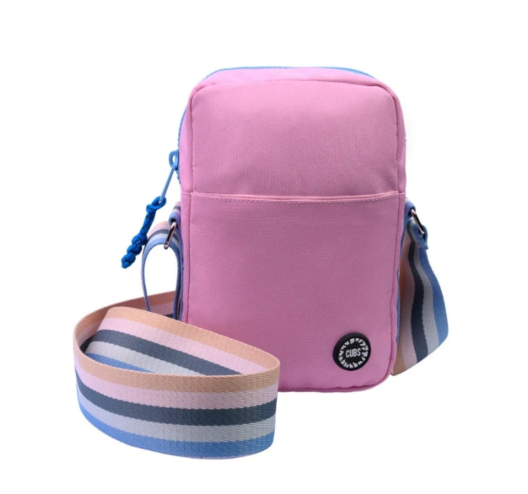 Light pink crossbody bag from CUBS with adjustable strap and simple design, ideal for casual or everyday use.