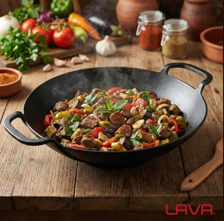 LAVA Wok 2-Hand, lightweight stainless steel cookware with two handles, suitable for stir-frying and cooking.