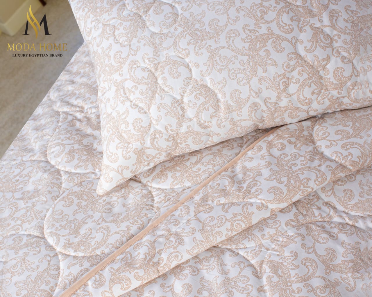 MODA HOME Lala quilted 3-piece coverlet set with matching pillowcases in a 240x260 cm size, featuring a soft, quilted fabric design.