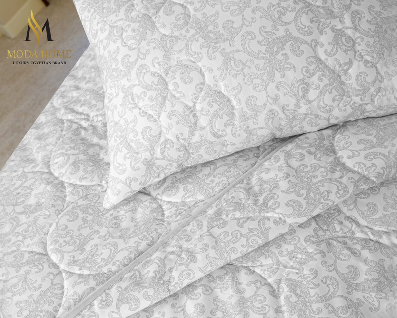 MODA HOME Lala Quilted 3-Piece Coverlet Set in 240x260 cm with a textured quilted design on soft fabric.