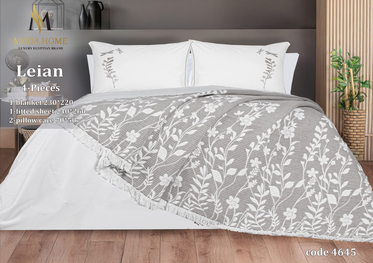 MODA HOME Layan Ghosn 4-piece coverlet set with coordinated bedding in a stylish design, perfect for bedroom decor.