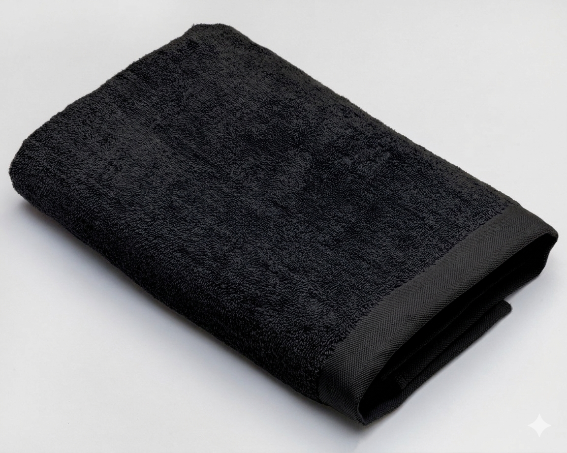 Black wide-border cotton towel from MODA HOME, 50x100 cm, with a soft texture and stylish border design.