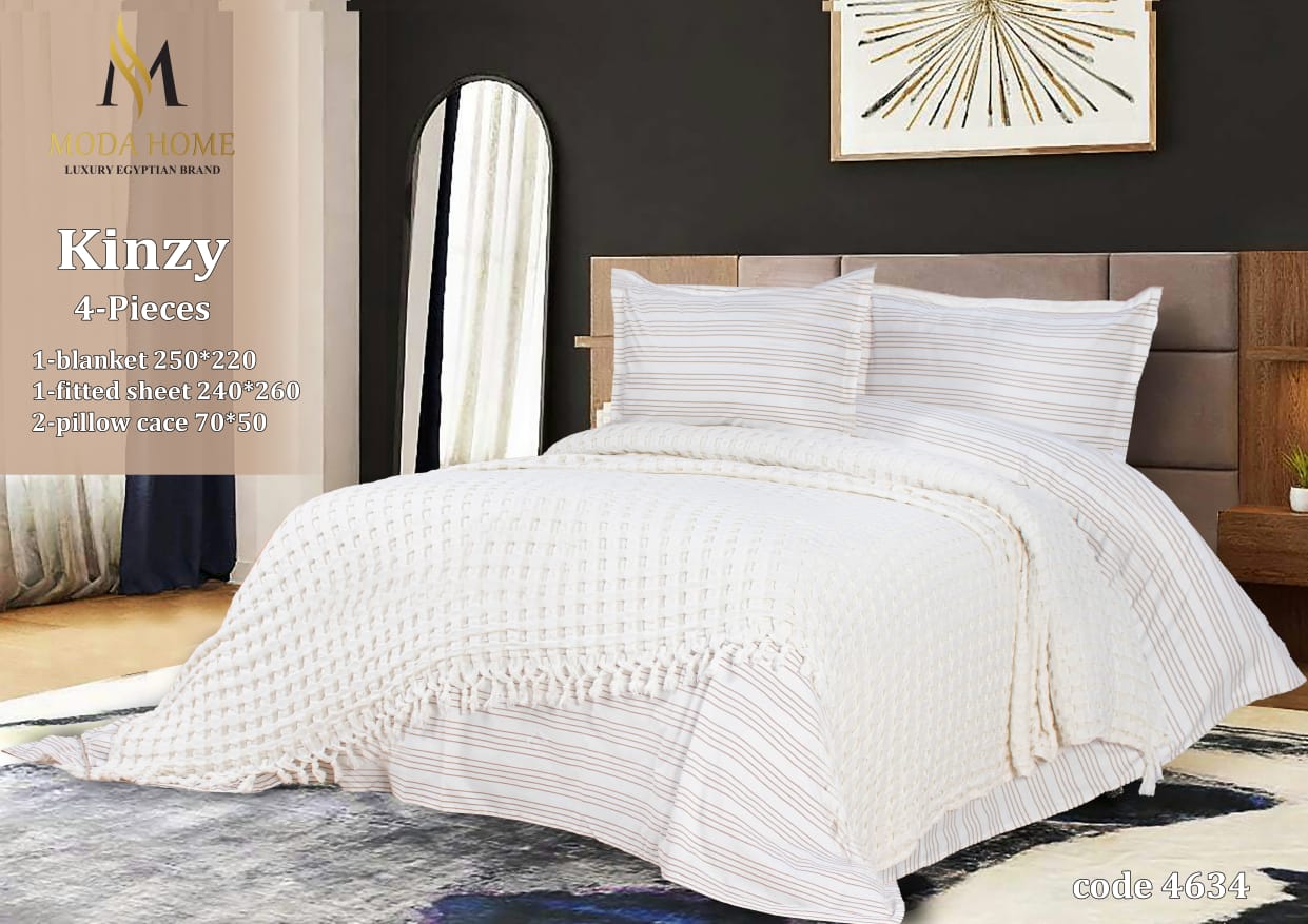 Kenzy 4-piece coverlet set by MODA HOME featuring a contemporary design in neutral tones on a bed.
